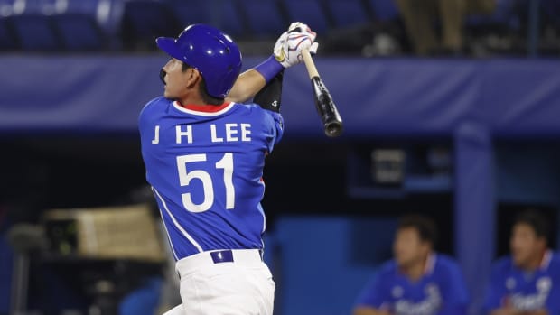 Aug 4, 2021; Yokohama, Japan; Team South Korea outfielder Jung Hoo Lee (51) hits a double against Japan in a baseball semifinal match during the Tokyo 2020 Olympic Summer Games at Yokohama Baseball Stadium. Mandatory Credit: Yukihito Taguchi-USA TODAY Sports